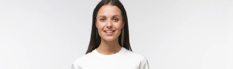 Young woman smiling, representing female fertility support and care at Dr Kate Burston Newcastle clinic