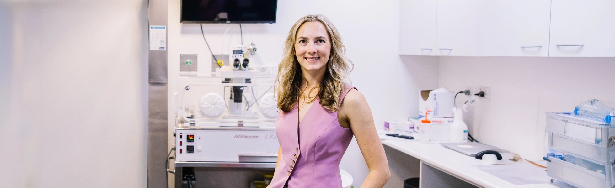 Dr Kate Burston Newcastle fertility specialist in clinic laboratory, IVF and reproductive health care
