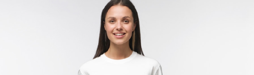 Young woman smiling, representing female fertility support and care at Dr Kate Burston Newcastle clinic