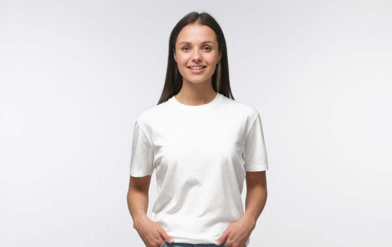 Smiling young woman symbolising female fertility care at Dr Kate Burston clinic Newcastle