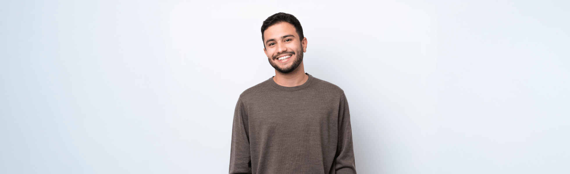 Young man smiling – male fertility patient, Newcastle clinic, Dr Kate Burston